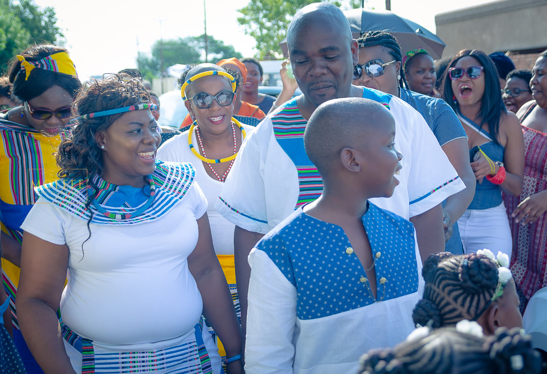 Traditional wedding guests celebrating